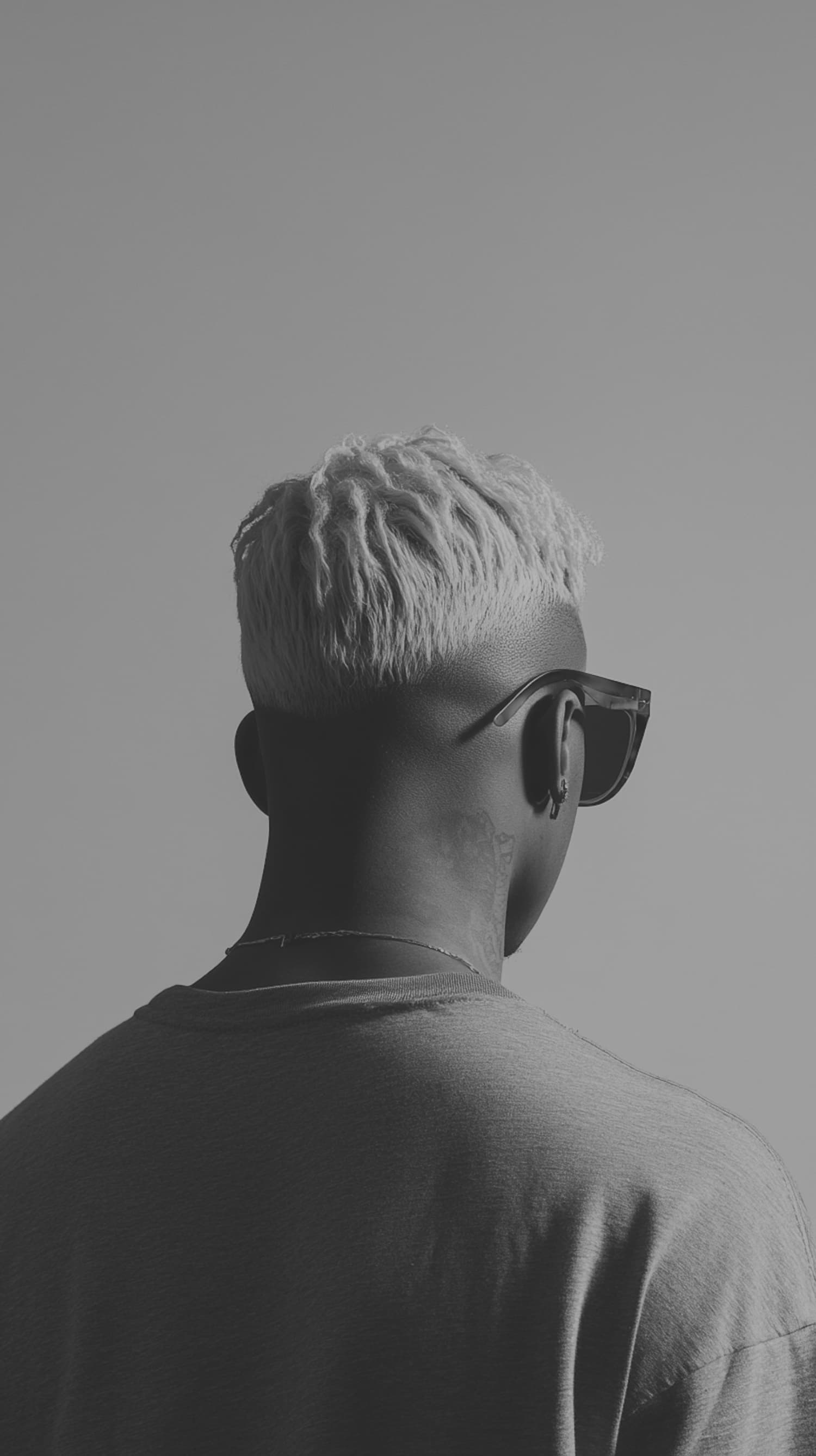 Monochrome rear portrait with a precision haircut